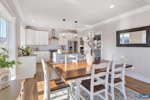 dining room with dark wood-type flooring and ornamental molding