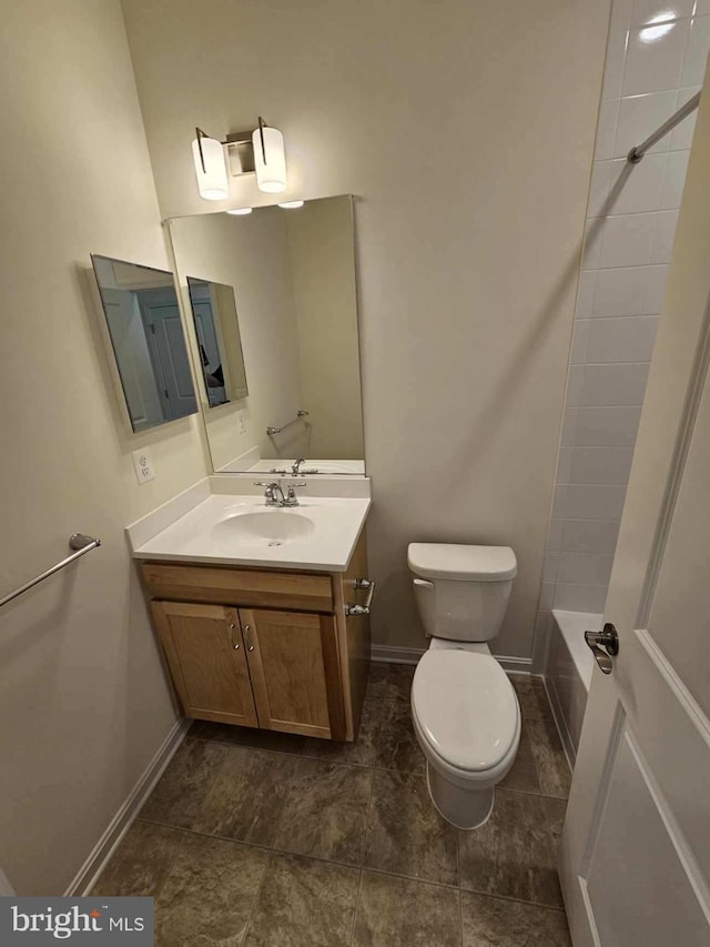 full bathroom featuring toilet, vanity, and shower / bathtub combination