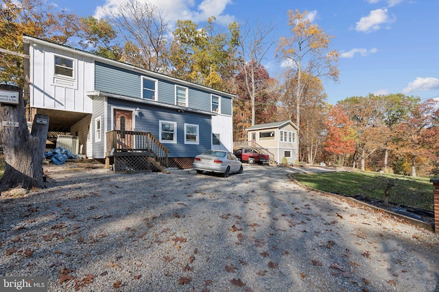 front of property featuring an outbuilding and a garage