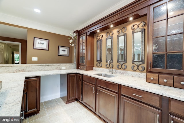 6318 Georgetown Pike, Mclean, VA 22101 - bar area featuring a sink, light tile patterned floors, and ornamental molding