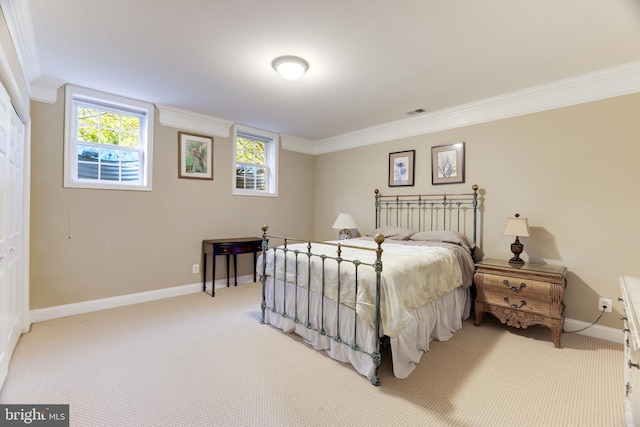 carpeted bedroom with crown molding