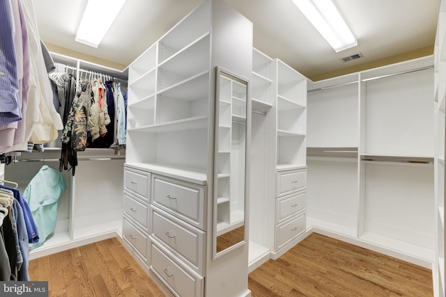 6318 Georgetown Pike, Mclean, VA 22101 - spacious closet featuring light wood-style floors