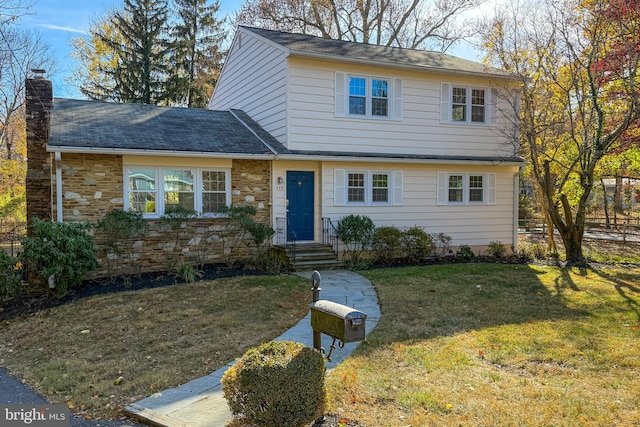339 Hamilton Ave, Princeton, NJ 08540 - view of front of property with a front lawn, entry steps, a chimney, and stone siding
