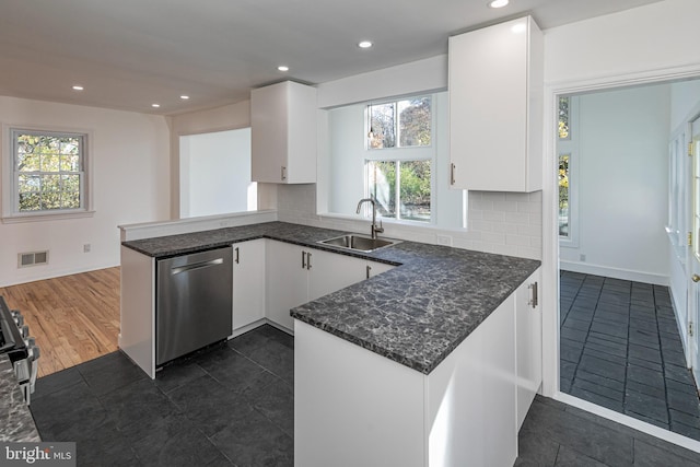 339 Hamilton Ave, Princeton, NJ 08540 - kitchen featuring dishwasher, a sink, a peninsula, white cabinetry, and recessed lighting