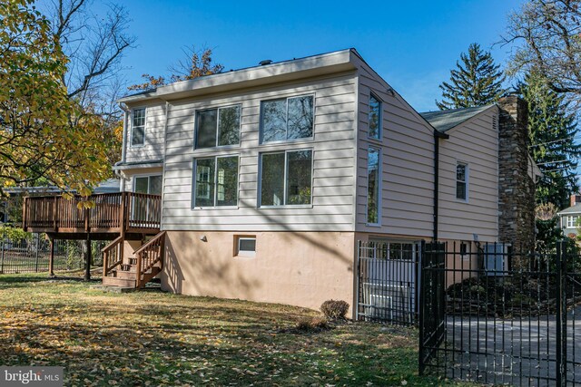 339 Hamilton Ave, Princeton, NJ 08540 - rear view of house with stairs, a deck, fence, and a gate