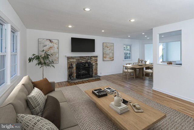 339 Hamilton Ave, Princeton, NJ 08540 - living area with wood finished floors, a fireplace, recessed lighting, and baseboards
