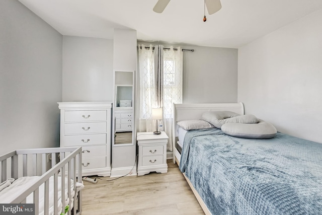 bedroom featuring ceiling fan and light wood-type flooring