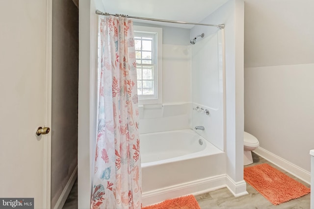 bathroom featuring toilet and shower / bathtub combination with curtain