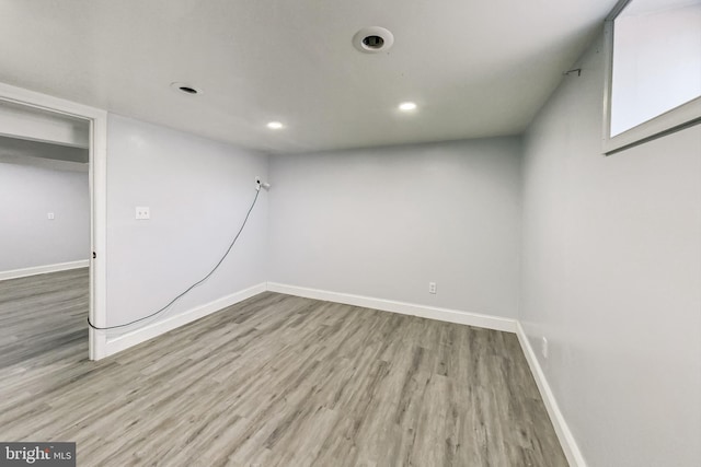 spare room with light wood-type flooring