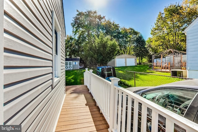 wooden balcony featuring a deck