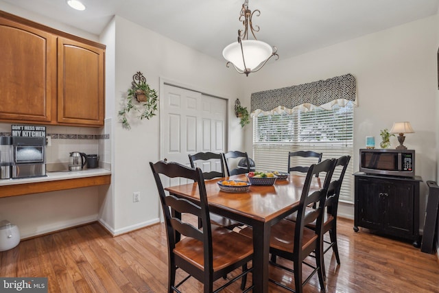 dining room featuring light hardwood / wood-style flooring