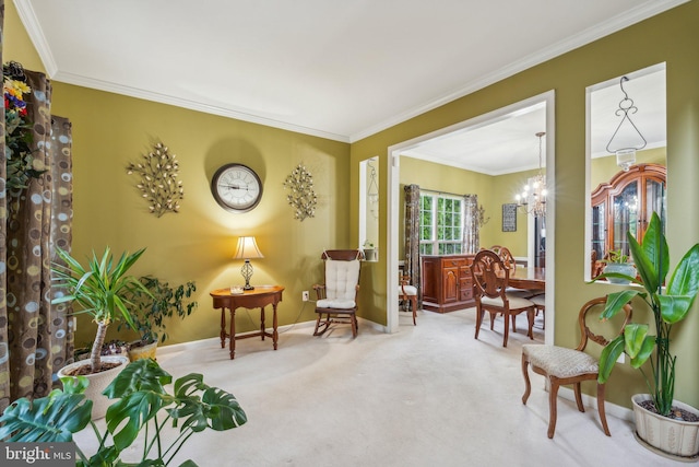 living area featuring an inviting chandelier, carpet floors, and crown molding