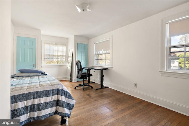 bedroom featuring hardwood / wood-style floors