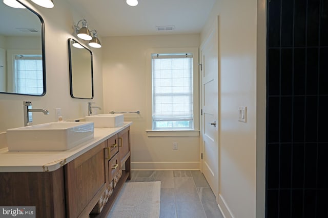 bathroom featuring vanity and tile patterned floors