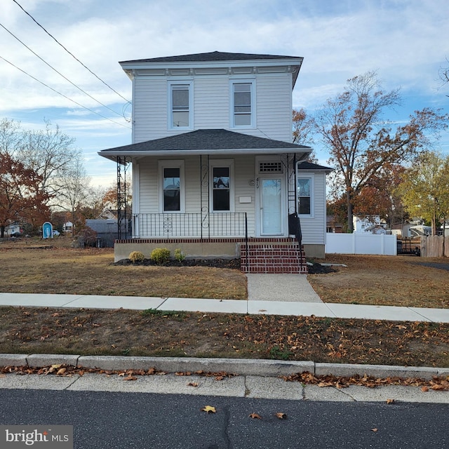 view of front of property featuring covered porch