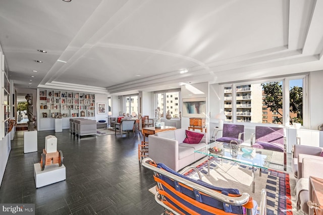 dining space with a raised ceiling