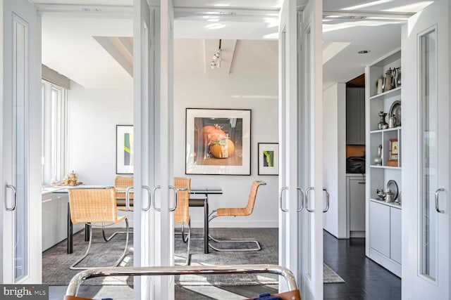 interior space featuring french doors and dark wood-type flooring