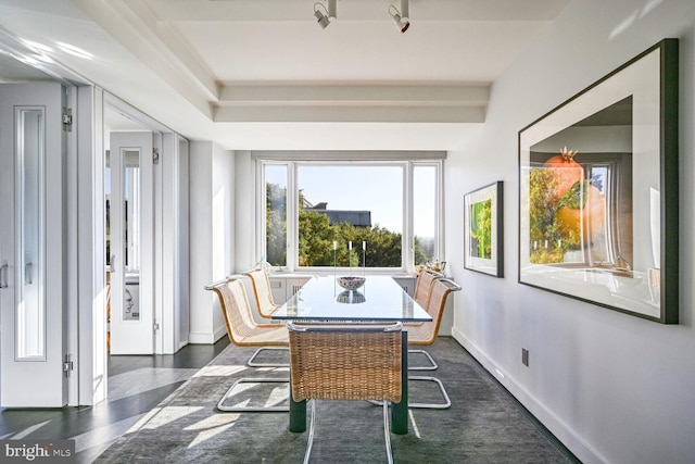 sunroom with beamed ceiling