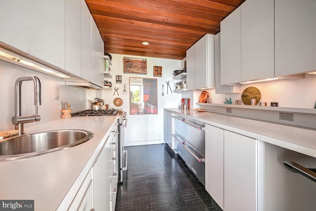 kitchen featuring open shelves, wood ceiling, a sink, light countertops, and white cabinets
