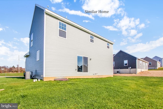 317 Valley View Cir Unit 98, York, PA 17408 - rear view of house with a lawn and central AC