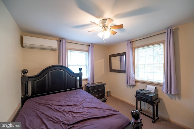 bedroom with ceiling fan, multiple windows, light colored carpet, and a wall mounted AC