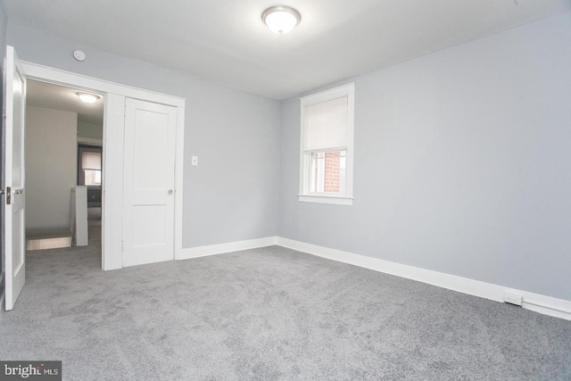 spare room featuring carpet flooring