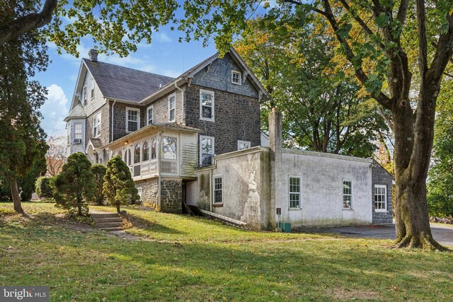 exterior space with a lawn