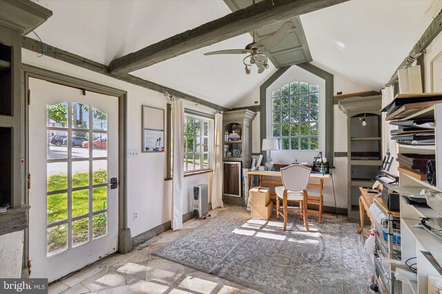 home office featuring plenty of natural light, lofted ceiling, and ceiling fan