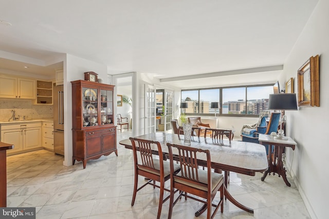 dining room featuring sink