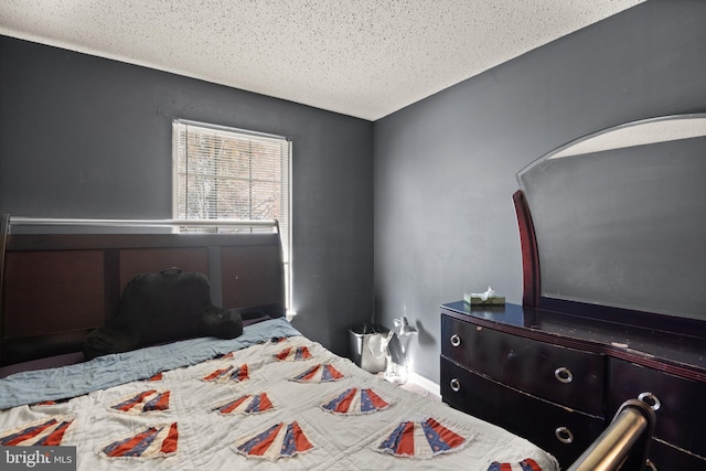 bedroom featuring a textured ceiling