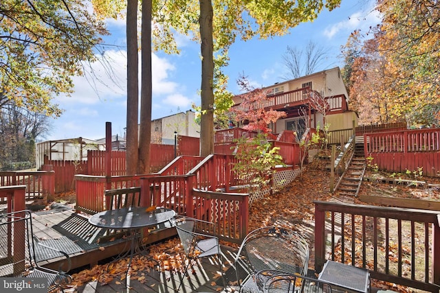 8600 Sapienza Dr, Fort Washington, MD 20744 - wooden terrace featuring a fenced backyard and a vegetable garden