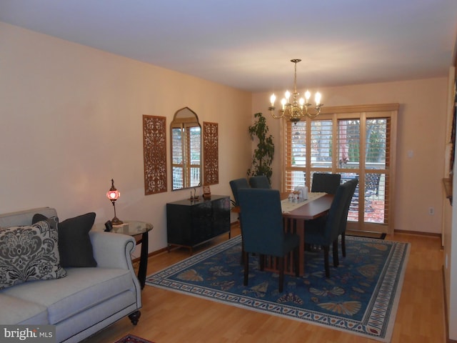 603 Bloomfield Dr, Westampton, NJ 08060 - dining area featuring a chandelier and wood finished floors