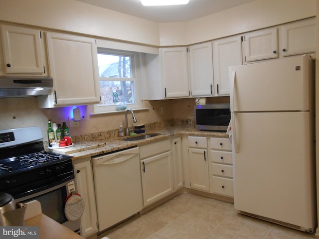 603 Bloomfield Dr, Westampton, NJ 08060 - kitchen with appliances with stainless steel finishes, under cabinet range hood, a sink, white cabinets, and light stone countertops