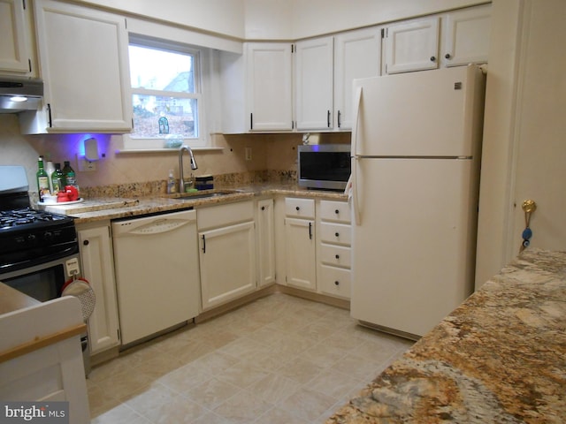 603 Bloomfield Dr, Westampton, NJ 08060 - kitchen featuring appliances with stainless steel finishes, a sink, under cabinet range hood, light stone countertops, and white cabinetry