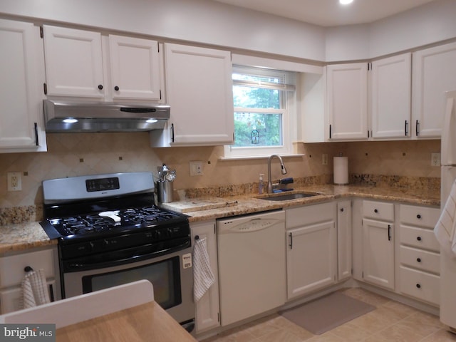 603 Bloomfield Dr, Westampton, NJ 08060 - kitchen with white dishwasher, under cabinet range hood, stainless steel gas range, a sink, and white cabinetry