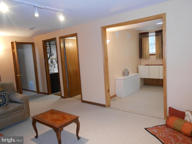 603 Bloomfield Dr, Westampton, NJ 08060 - living room with carpet floors, rail lighting, and baseboards