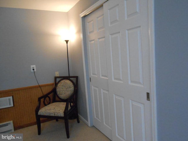 603 Bloomfield Dr, Westampton, NJ 08060 - living area with a baseboard heating unit and wooden walls