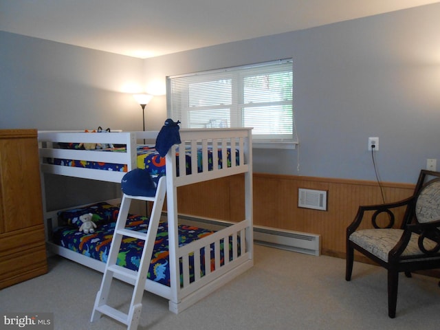 603 Bloomfield Dr, Westampton, NJ 08060 - bedroom with a baseboard radiator, wainscoting, carpet floors, and wooden walls