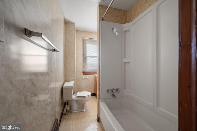 bathroom featuring toilet and washtub / shower combination