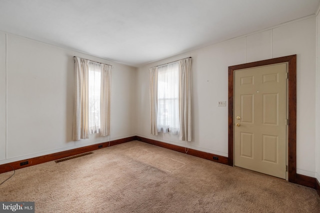 spare room with carpet floors