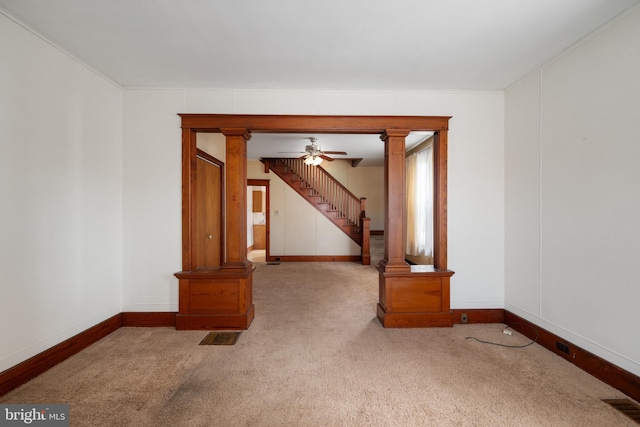 carpeted spare room with ornamental molding