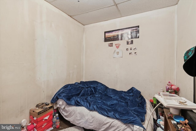 bedroom with a paneled ceiling