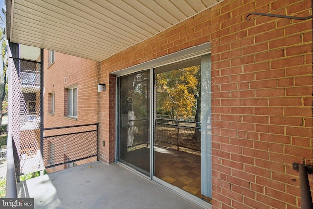 view of patio with a balcony