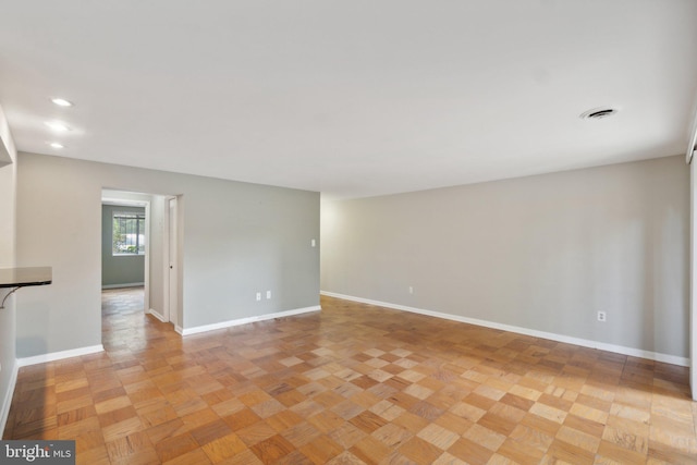 empty room featuring light parquet flooring