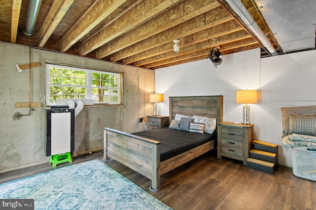 bedroom featuring dark hardwood / wood-style flooring