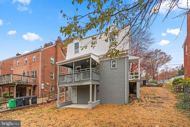 rear view of house with a deck