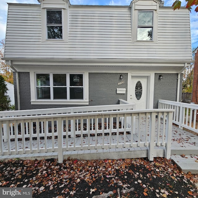 front of property featuring covered porch