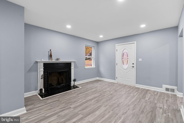 entrance foyer featuring light wood-type flooring