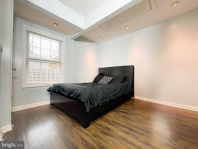 bedroom featuring dark hardwood / wood-style floors