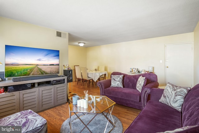 living room with dark wood-type flooring